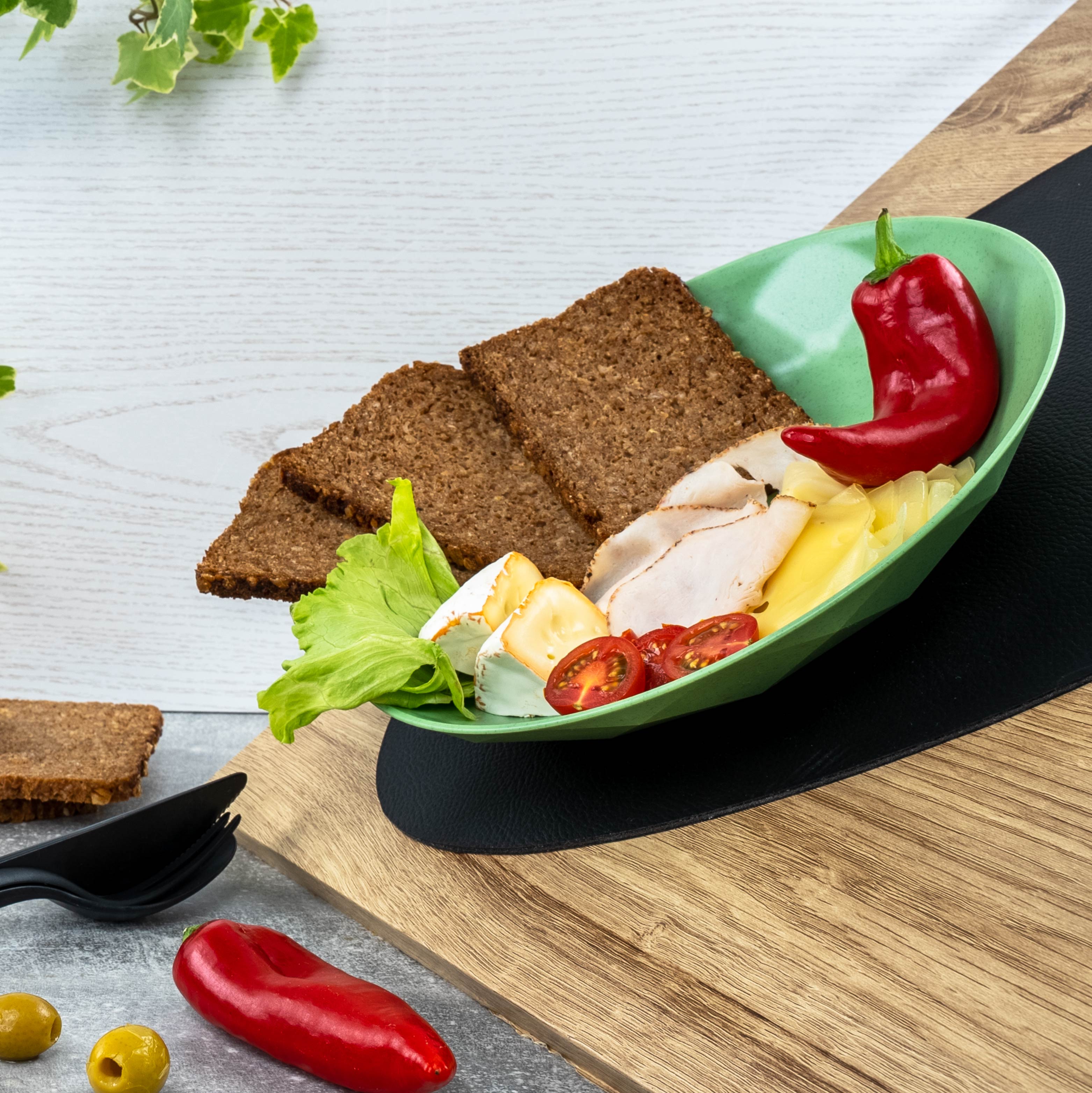 Magnetischer Teller wird durch metallisches Platzset in Schräglage fixiert